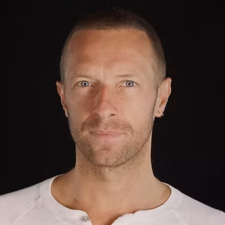 Portrait of Chris Martin, Honorary Founder and President of 0UTLYER.